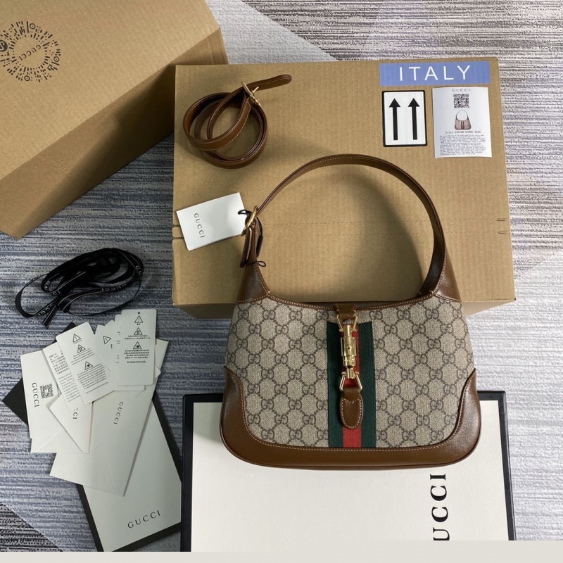 G*u*i top handle bags